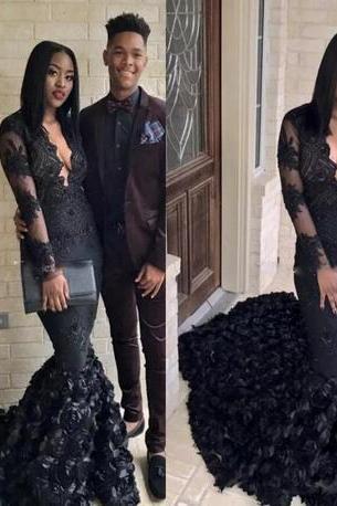 black prom dress with roses at the bottom